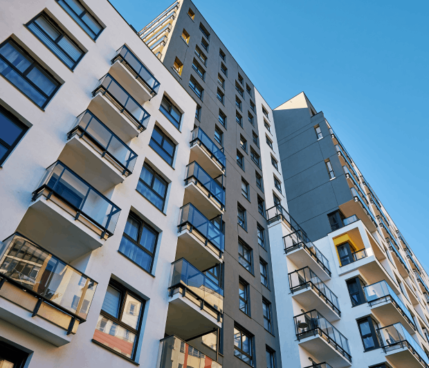 Modern apartment buildings with multiple balconies.